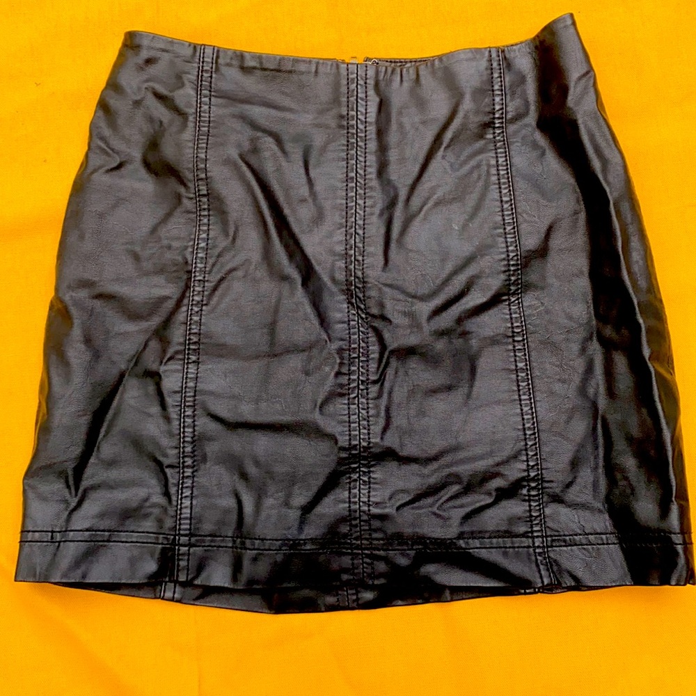 Free People black faux leather mini skirt. Size 0